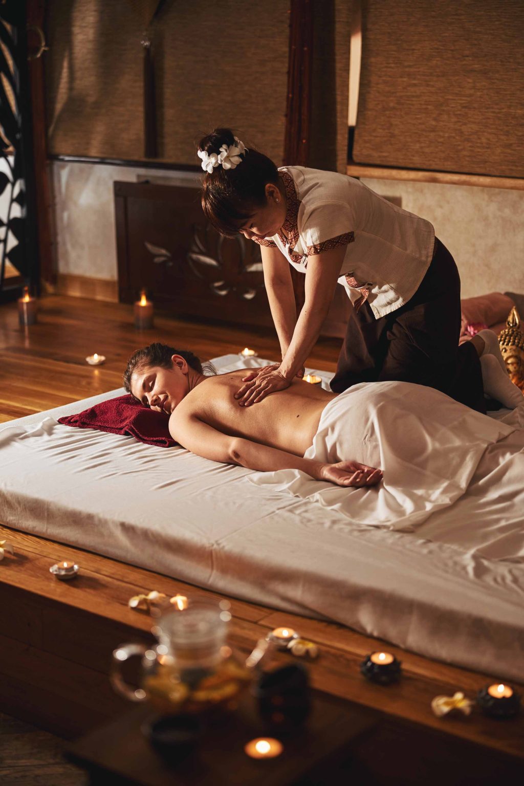 Thai Massage Salon Specialist Stroking Woman Back With Hands